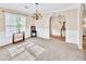 Spacious dining room featuring large windows and a chandelier at 1520 Great Oaks Dr, Lawrenceville, GA 30045