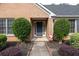 Close-up of front entrance with tasteful landscaping and inviting walkway at 1520 Great Oaks Dr, Lawrenceville, GA 30045