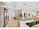 Charming kitchen with stainless appliances, ample cabinets, backsplash, breakfast bar with barstool seating at 1520 Great Oaks Dr, Lawrenceville, GA 30045