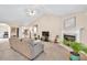 Comfortable living room featuring a fireplace and views into other areas of the home at 1520 Great Oaks Dr, Lawrenceville, GA 30045
