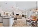 Open-concept living room featuring a fireplace and eat-in kitchen at 1520 Great Oaks Dr, Lawrenceville, GA 30045
