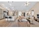 View of a living room with open floor plan with breakfast bar and view of front entrance at 1520 Great Oaks Dr, Lawrenceville, GA 30045