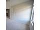 Bedroom with neutral carpet and trim at 1560 Iris Walk, Jonesboro, GA 30238