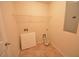 Laundry room with tile flooring, wire rack, and hookups at 1560 Iris Walk, Jonesboro, GA 30238