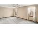 Large bedroom with carpeted floors and two large windows at 1791 Lake George Dr, Lithia Springs, GA 30122