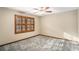 Bedroom with shuttered windows, carpeted floors and base trim at 1791 Lake George Dr, Lithia Springs, GA 30122