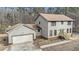 Charming two-story home with attached garage and inviting front porch at 1791 Lake George Dr, Lithia Springs, GA 30122
