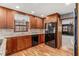 Updated kitchen with granite countertops, stainless steel appliances, and beautiful hardwood floors at 1791 Lake George Dr, Lithia Springs, GA 30122