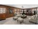 Cozy living room with wood paneling, fireplace, and natural light at 1791 Lake George Dr, Lithia Springs, GA 30122