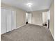 Bedroom with carpet, closet space, and ensuite bathroom at 2240 Spalding Dr, Marietta, GA 30062