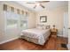Comfortable bedroom featuring hardwood floors, a large window, and neutral decor at 3146 Alston Dr, Decatur, GA 30032