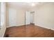 A large bedroom with wood-look floors offers ample space and natural light at 3146 Alston Dr, Decatur, GA 30032