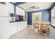 Eat-in kitchen with tile floors, and ample cabinet space for storage and functionality at 3146 Alston Dr, Decatur, GA 30032