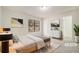 Comfortable bedroom with natural light, a spacious layout, and a serene atmosphere at 7004 Pat Mell Se Pl, Smyrna, GA 30080