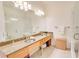 Modern bathroom with dual sinks, granite counters, and glass shower at 1430 Dresden Ne Dr # 225, Atlanta, GA 30319
