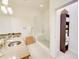 Modern bathroom features a double sink vanity, glass enclosed shower, and storage shelves at 1430 Dresden Ne Dr # 225, Atlanta, GA 30319