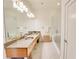 Bright bathroom with granite countertops, dual sinks, and glass-enclosed shower at 1430 Dresden Ne Dr # 225, Atlanta, GA 30319