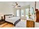 Bright bedroom features hardwood floors, neutral color palette, and large windows at 1430 Dresden Ne Dr # 225, Atlanta, GA 30319