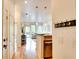 Inviting condo hallway leads to a bright living area with wood floors and modern fixtures at 1430 Dresden Ne Dr # 225, Atlanta, GA 30319