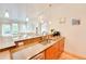 Open-concept kitchen with granite countertops, stainless steel appliances, and modern lighting at 1430 Dresden Ne Dr # 225, Atlanta, GA 30319