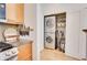 Cozy kitchen featuring granite countertops, modern appliances, and in-unit laundry at 1430 Dresden Ne Dr # 225, Atlanta, GA 30319