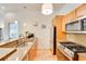 Well-equipped kitchen with stainless steel appliances, breakfast bar, and ample cabinet space at 1430 Dresden Ne Dr # 225, Atlanta, GA 30319