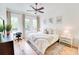 Bright and airy main bedroom featuring hardwood floors and modern decor at 1430 Dresden Ne Dr # 225, Atlanta, GA 30319