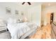 Comfortable main bedroom featuring hardwood floors and modern decor at 1430 Dresden Ne Dr # 225, Atlanta, GA 30319