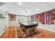 Spacious basement rec room with pool table is a great space for entertaining guests at 220 Galesburg Dr, Lawrenceville, GA 30044