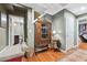 Finished basement displays vintage cabinet and an open layout to a rec area and bathroom at 220 Galesburg Dr, Lawrenceville, GA 30044