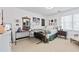 Bedroom with a full bed, desk and a window with natural light at 220 Galesburg Dr, Lawrenceville, GA 30044