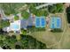 Community pool and tennis courts nestled among mature trees, offering recreational amenities for residents at 220 Galesburg Dr, Lawrenceville, GA 30044