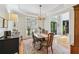 Classic dining room featuring hardwood floors, neutral paint, and ample natural light at 220 Galesburg Dr, Lawrenceville, GA 30044