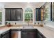 Kitchen featuring stainless steel appliances, countertops, and plenty of natural light at 220 Galesburg Dr, Lawrenceville, GA 30044