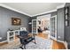 Stylish office with hardwood floors, French doors, and a modern workspace at 220 Galesburg Dr, Lawrenceville, GA 30044