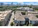 Aerial shot showcases the Atlanta skyline behind the apartment complex and surrounding neighborhood at 400 17Th Nw St # 1119, Atlanta, GA 30363