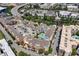 Aerial view of a multi-story apartment complex featuring a rooftop pool and parking garage at 400 17Th Nw St # 1119, Atlanta, GA 30363