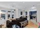 Open-concept living area flowing into the kitchen, featuring a comfortable sectional and stylish decor at 400 17Th Nw St # 1119, Atlanta, GA 30363