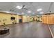 Bright yoga studio featuring ceiling fans, mirrored wall, and cushioned floors at 400 17Th Nw St # 1119, Atlanta, GA 30363
