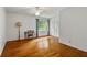 Bedroom with hardwood floors, ceiling fan, window and closet with double doors at 4261 Brookview Se Dr, Atlanta, GA 30339