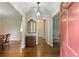 Elegant foyer with hardwood floors, a decorative mirror, and a glimpse into adjoining rooms at 4261 Brookview Se Dr, Atlanta, GA 30339