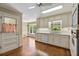 Functional kitchen featuring white cabinetry, modern appliances, and a charming breakfast nook at 4261 Brookview Se Dr, Atlanta, GA 30339