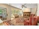 Cozy living room featuring a fireplace, large windows, and comfortable seating arrangement at 4261 Brookview Se Dr, Atlanta, GA 30339