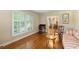 Spacious living room featuring hardwood floors and a view of the dining area at 4261 Brookview Se Dr, Atlanta, GA 30339