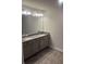 Bathroom with a double vanity and granite countertops at 6423 Rosetta Drive, Unit 66 # 66, South Fulton, GA 30331
