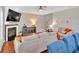 Comfortable living room featuring a fireplace, neutral tones, and hardwood floors at 813 Poplar Ter, Canton, GA 30115