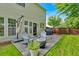 Outdoor patio boasts seating, a grill, and easy access to the home's interior at 813 Poplar Ter, Canton, GA 30115