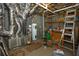 Unfinished basement with HVAC equipment, water heater and exposed ductwork at 1225 Pitts Chapel, Newborn, GA 30056