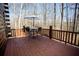 Deck with a table and chairs, perfect for enjoying the scenery at 1225 Pitts Chapel, Newborn, GA 30056