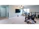 Bonus room or flex space with carpet and a window, also equipped with a wall-mounted television at 1570 Shire Village Dr, Sugar Hill, GA 30518